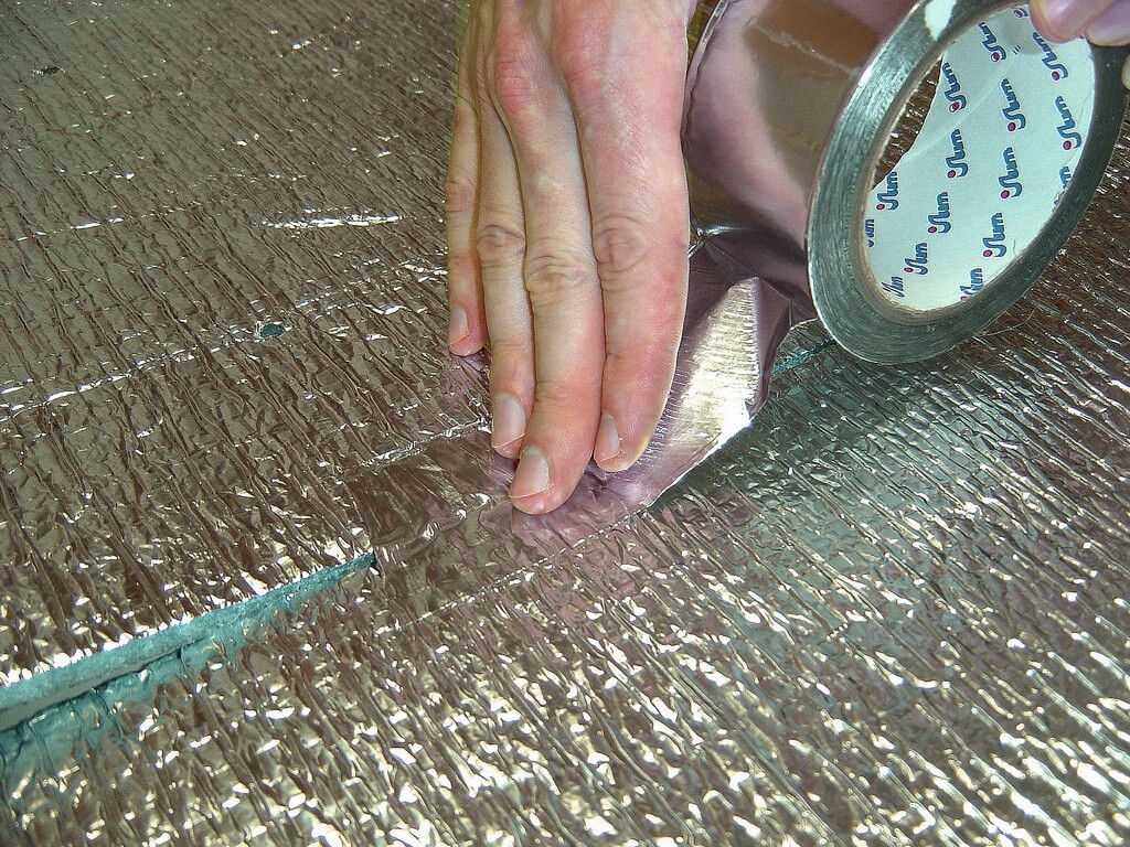 Gluing of joints of penofol with adhesive tape