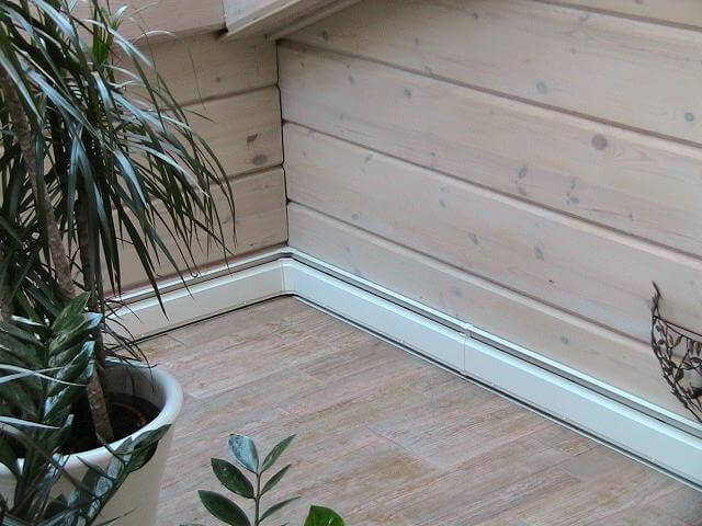 A clear view of the plinth heating in a wooden house
